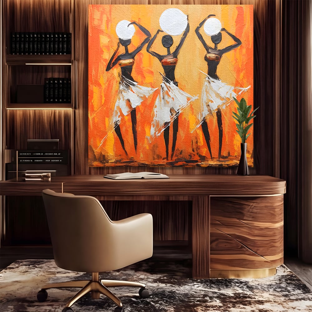 Tablou canvas cu tablou canvas cu trei dansatoare africane, fara rama, pe sasiu de lemn, pe perete intr-un birou